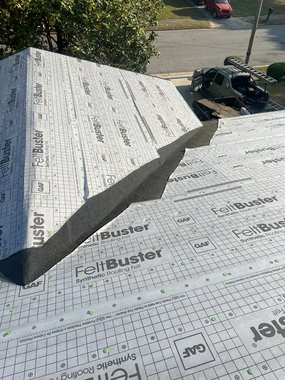 GAF synthetic underlayment installed up to the roof ridge
