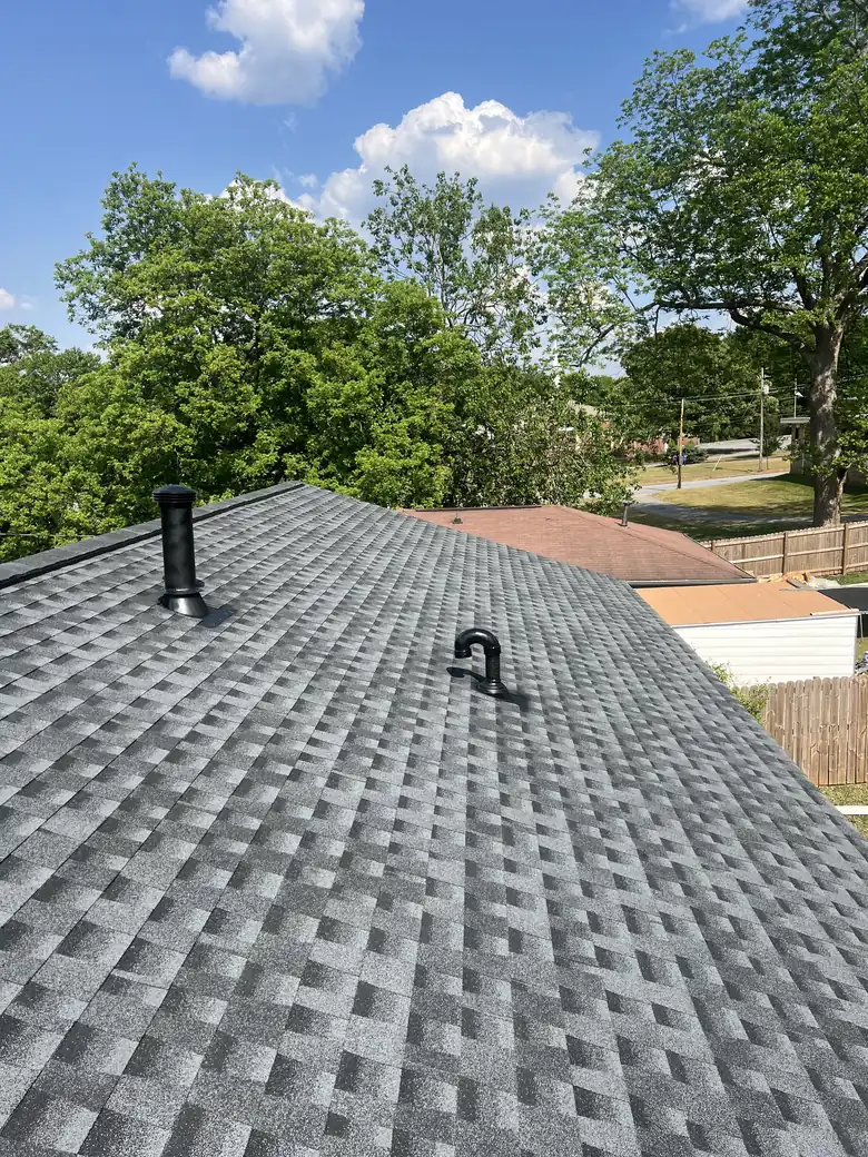New shingle roof with a fresh pipe boot