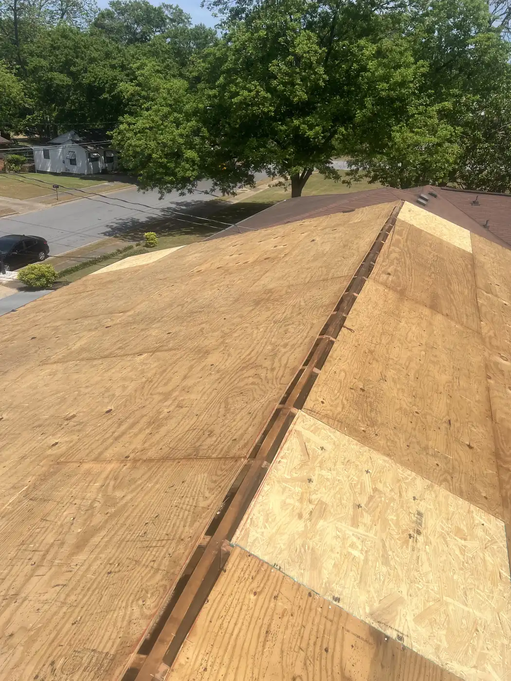 New plywood roof decking installed during a re-roof